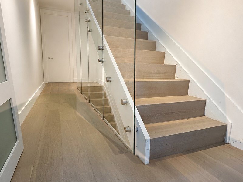 Hardwood stairs by Wengo Flooring in Victoria Park FL